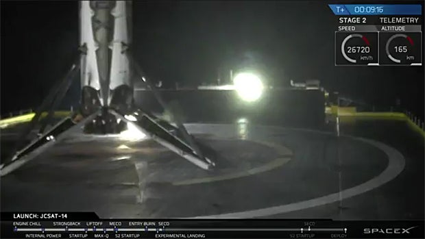 SpaceX lands stage of just-launched rocket on ship at sea - CBS News