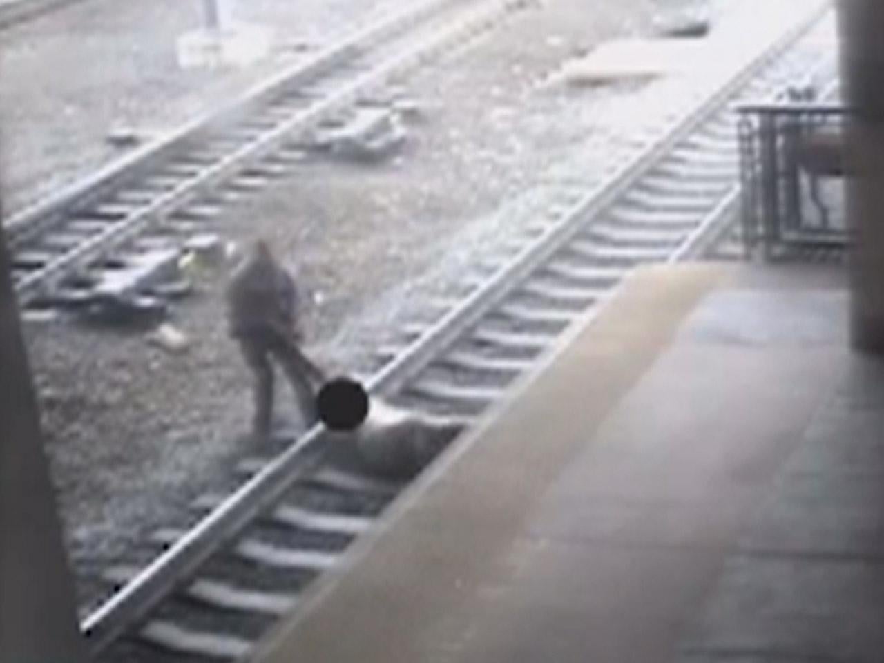 N.J. officer saves man from tracks seconds before train arrives CBS News