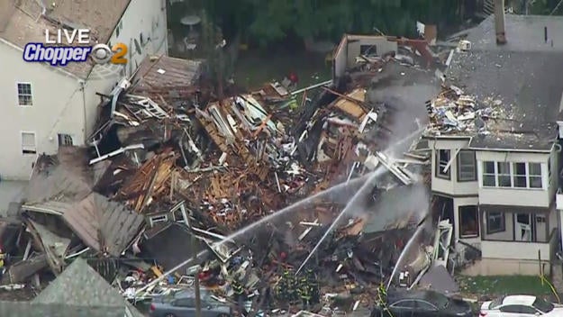 Explosion destroys two New Jersey homes after gas smell reported - CBS News