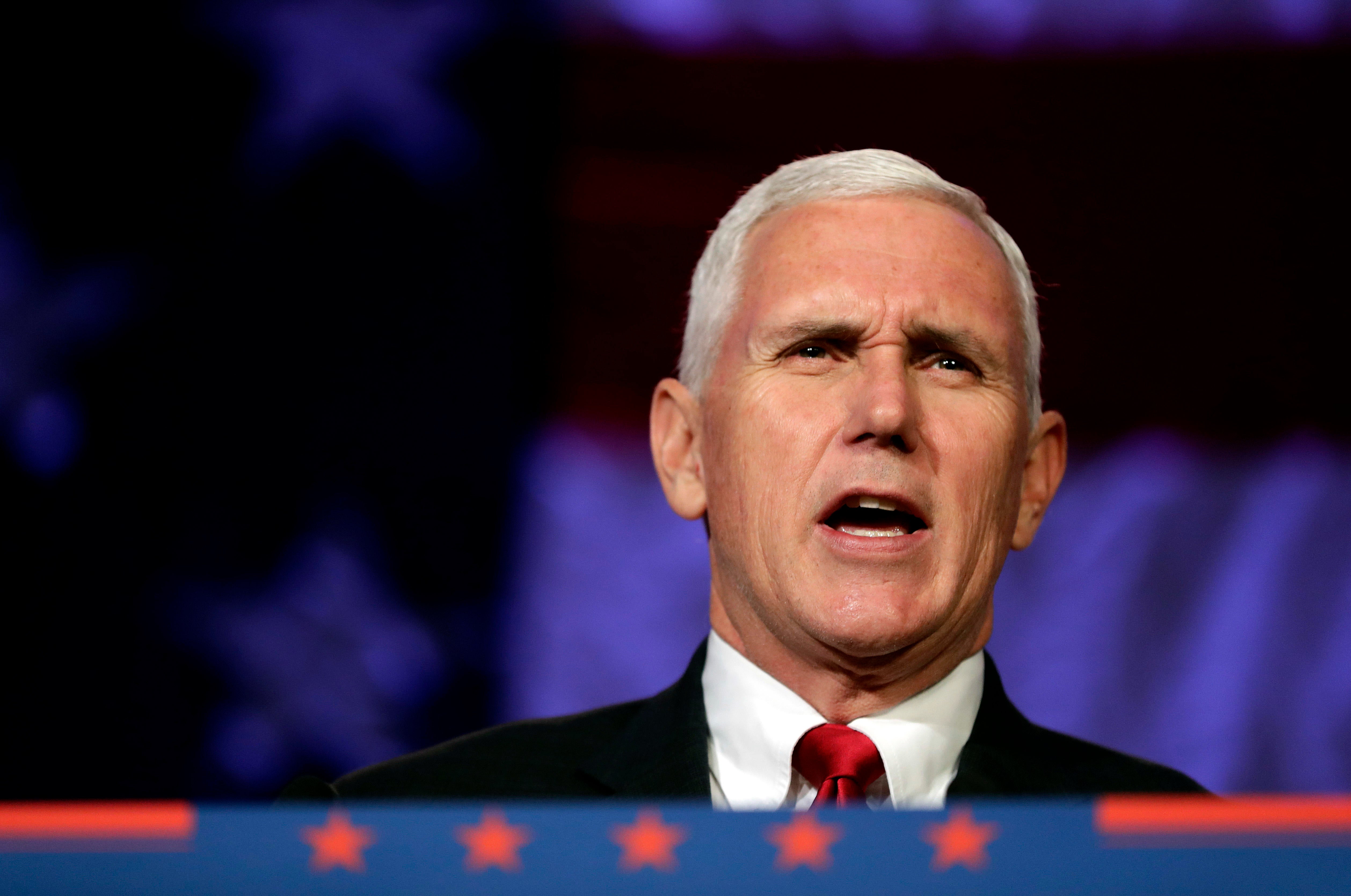 Mike Pence visits memorials of slain Iowa police officers - CBS News