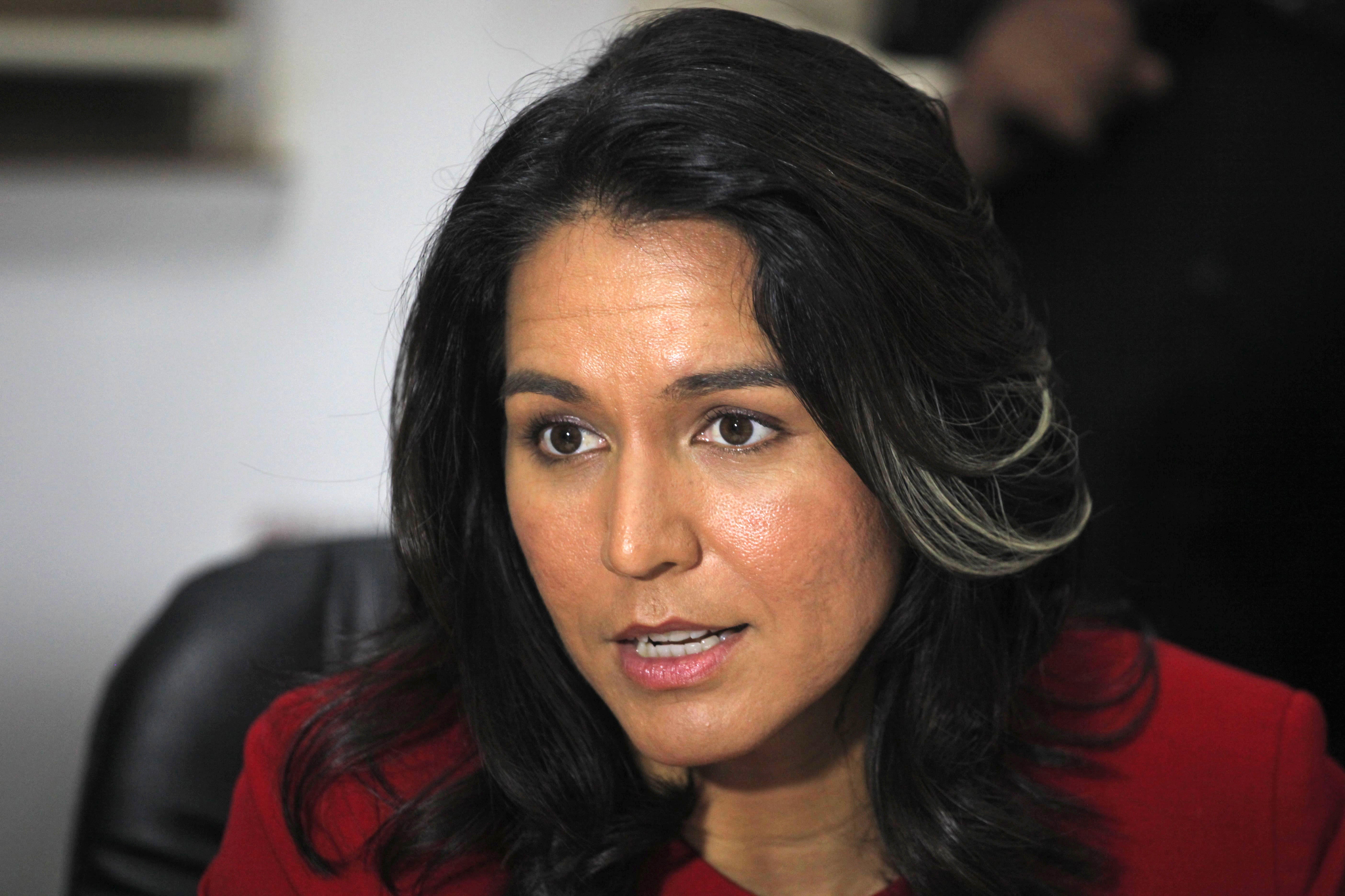 Unease over Congresswoman Tulsi Gabbard's meeting with President Bashar  al-Assad during Syria trip - CBS News