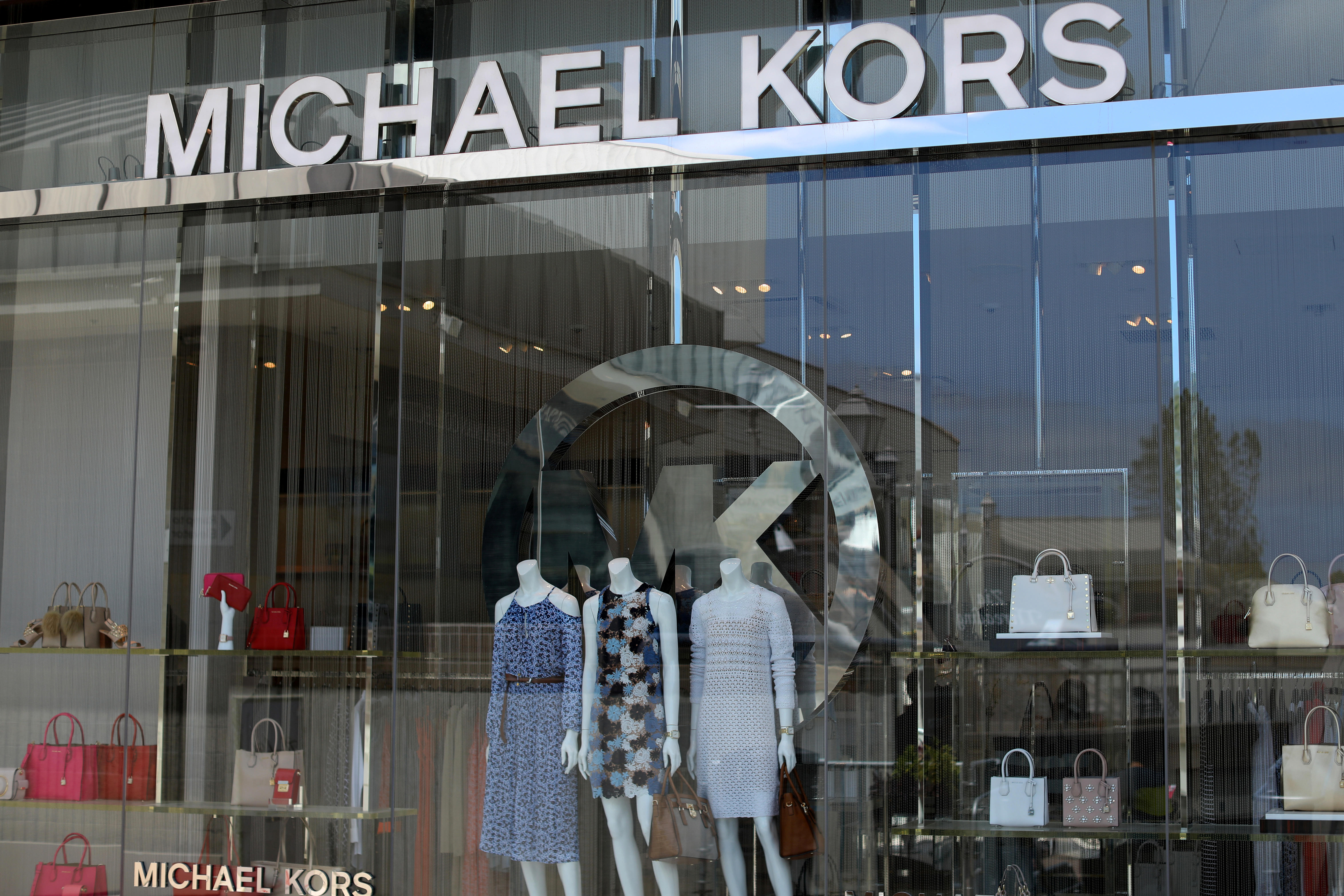 Michael Kors buying Versace fashion house for $2 billion - CBS News