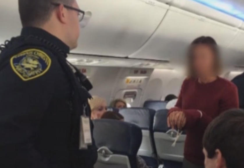 Flight Diverted After Woman Apparently Tries To Open Emergency Exit ...