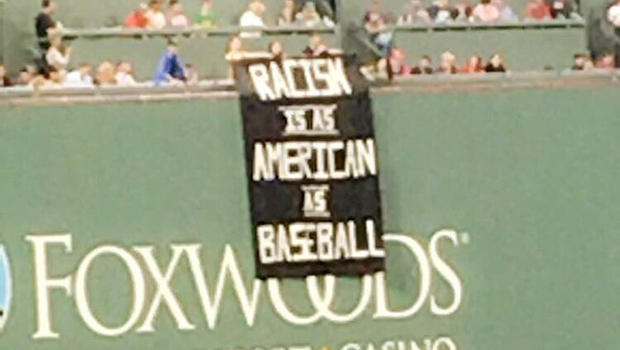 Fans unfurl racism banner from Green Monster during Red Sox game – Boston  Herald