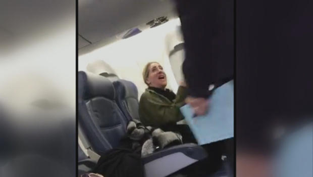 Woman kicked off plane for viral 'not real!' video has new surprise -  TheStreet