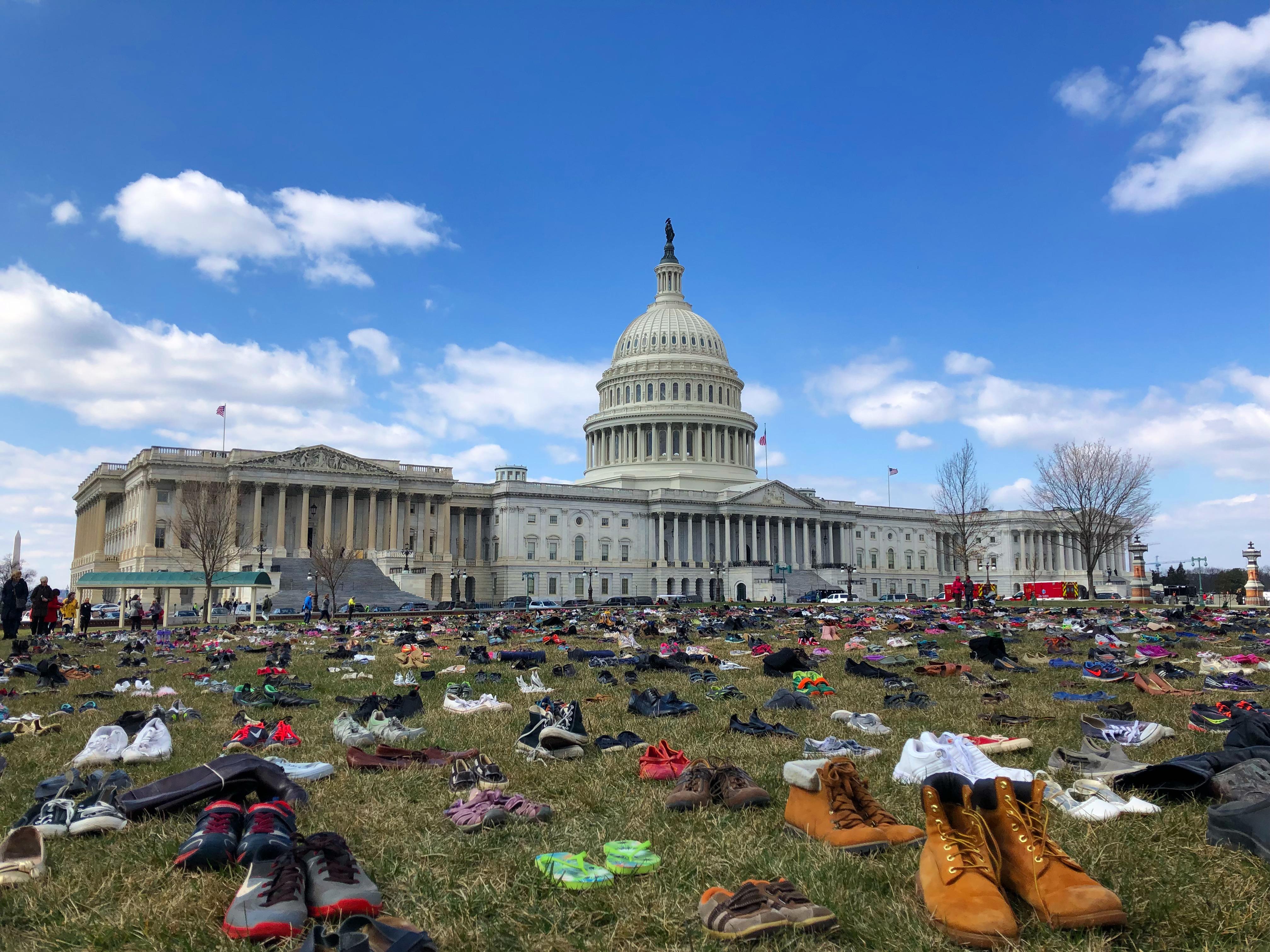 Activists lay thousands of shoes outside Capitol for children killed by ...