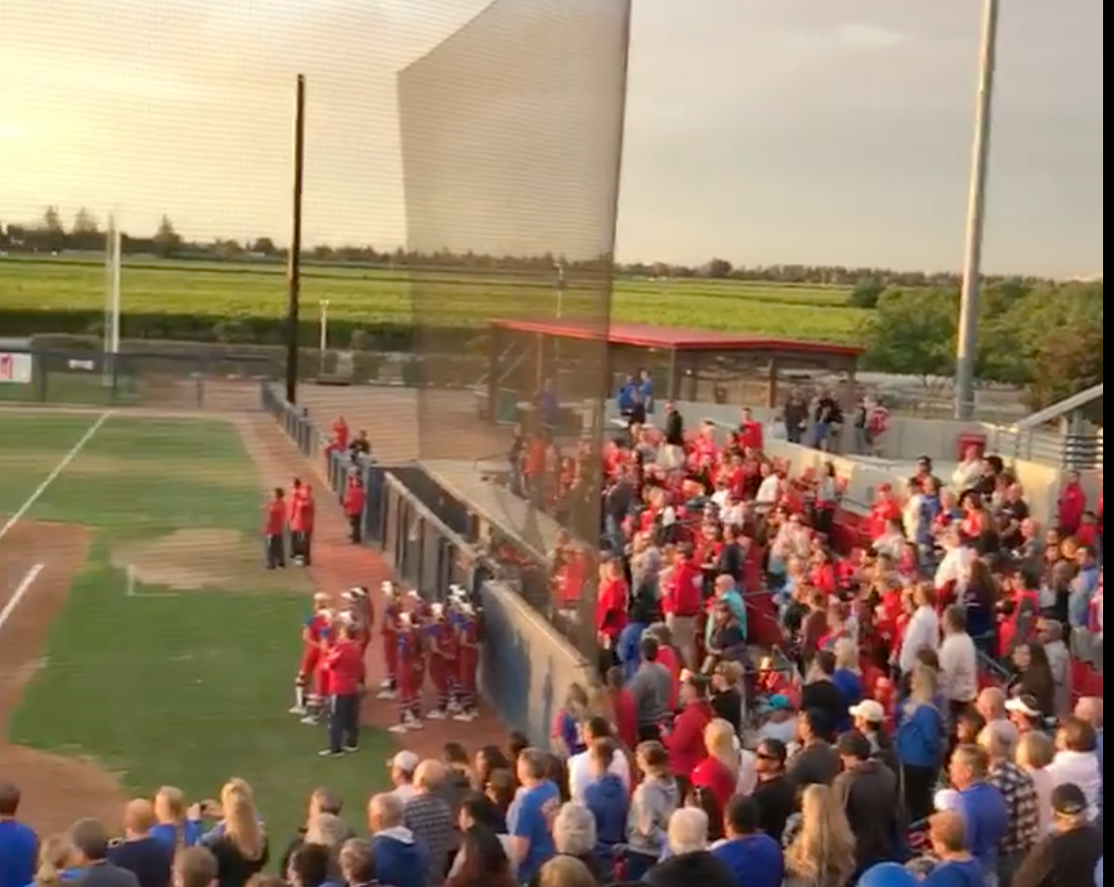 Why do we sing the national anthem before sporting events?