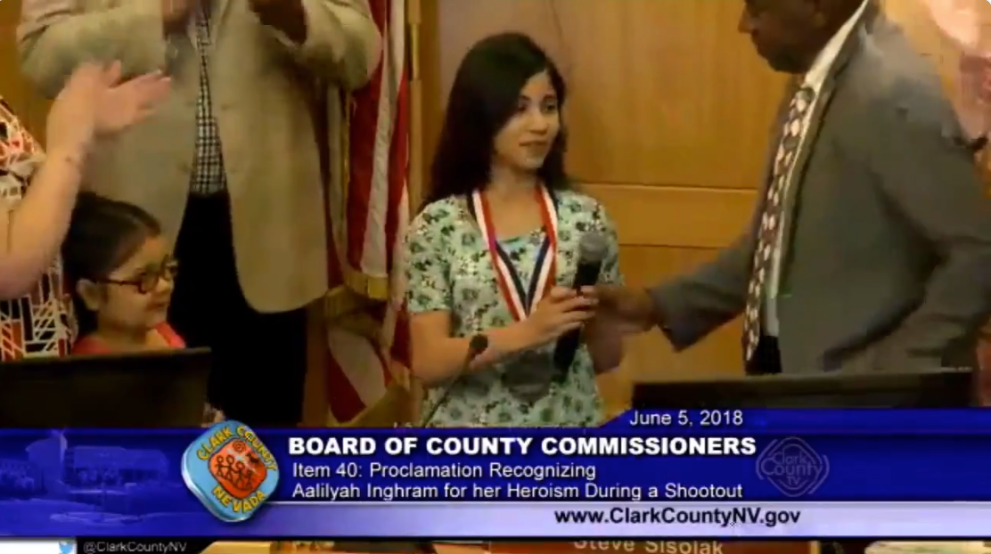 10-year-old girl shot while shielding baby brother receives medal for ...