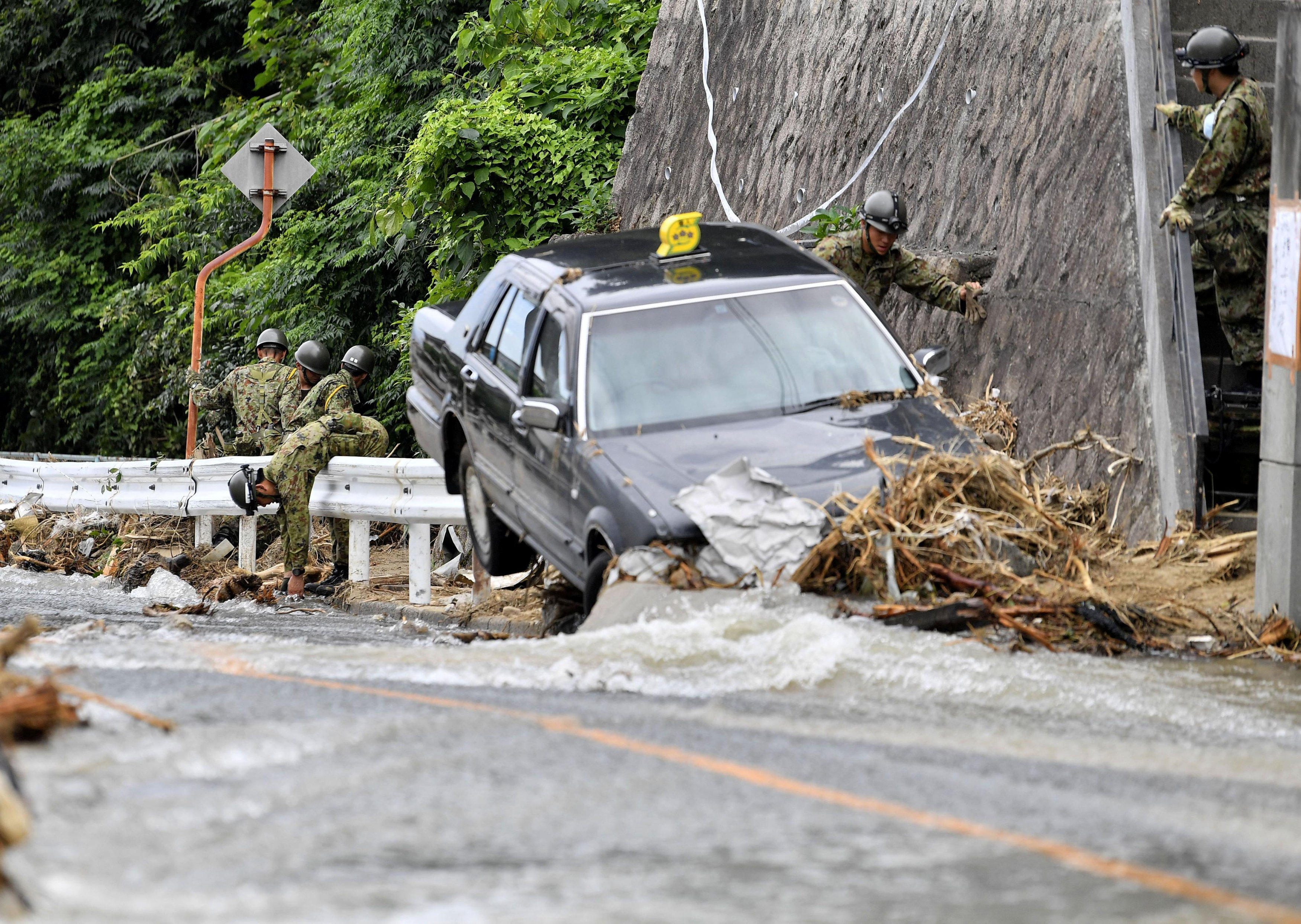 Flooding in Japan leaves at least 200 dead as Hiroshima prefecture