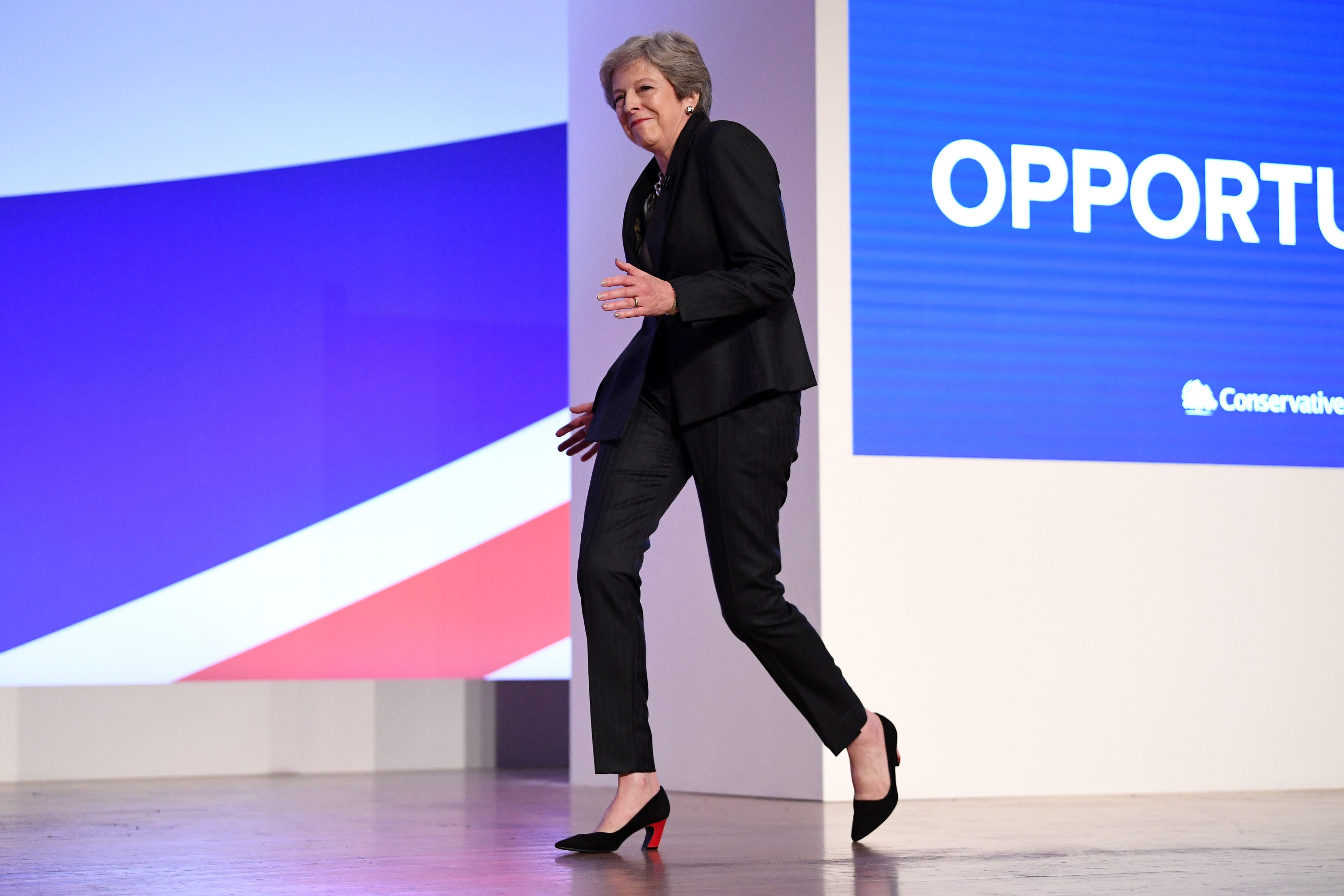 british-prime-minister-theresa-may-arrives-to-abba-s-dancing-queen-at