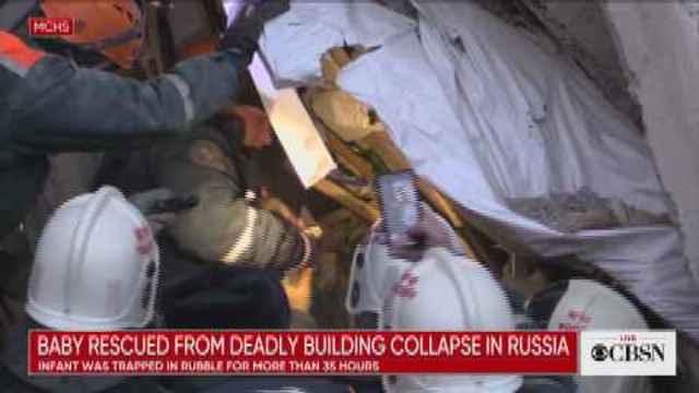 Baby pulled alive from rubble 35 hours after deadly apartment collapse ...