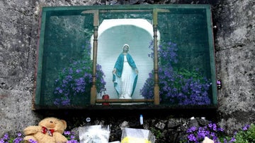 Excavations beginning at mass grave site of babies and children at