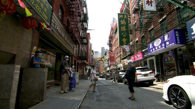 Asian-American woman punched on New York City sidewalk in attack caught ...