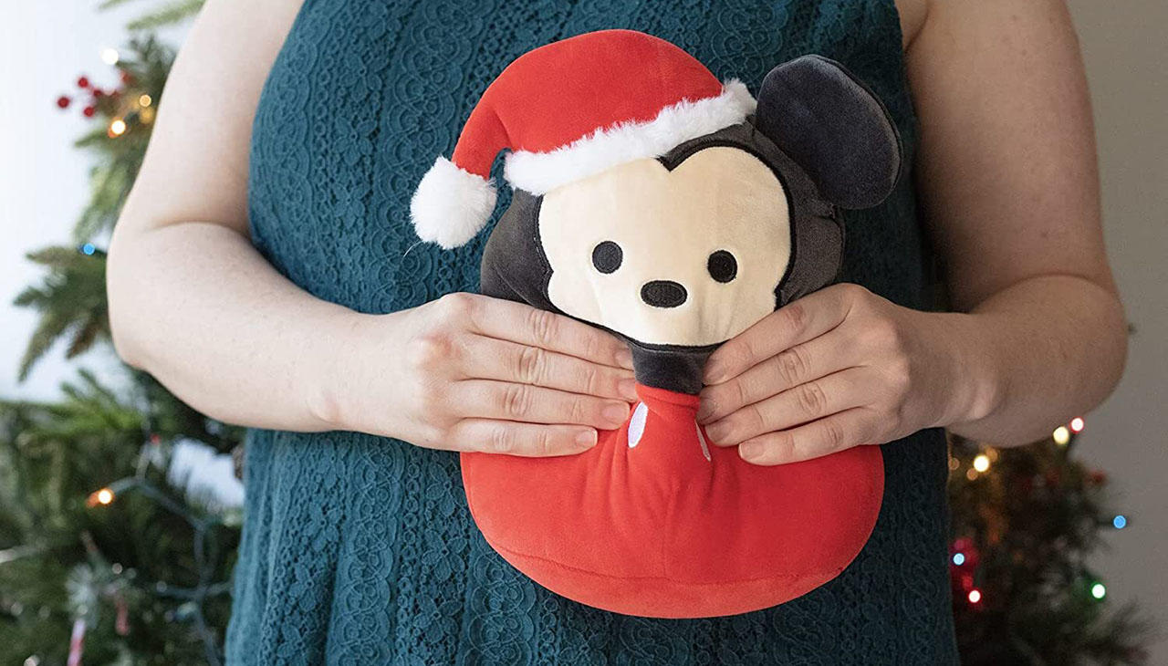 person holding a Mickey Mouse Disney Squishmallows 