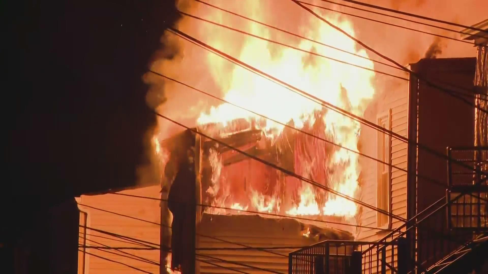 Back porch catches fire at apartment building in Albany Park - CBS Chicago