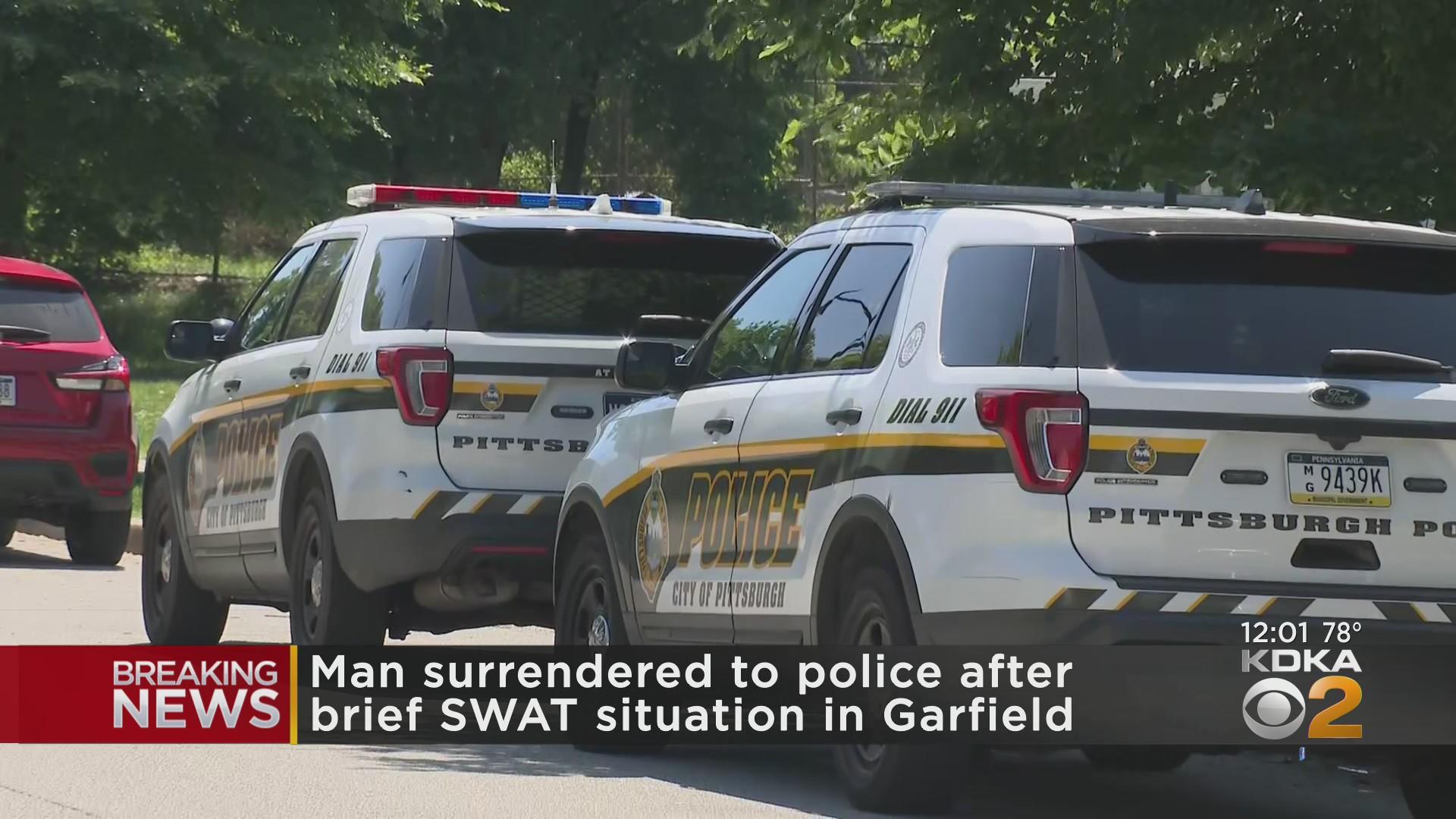 Man surrenders to police after barricading himself in Garfield home ...