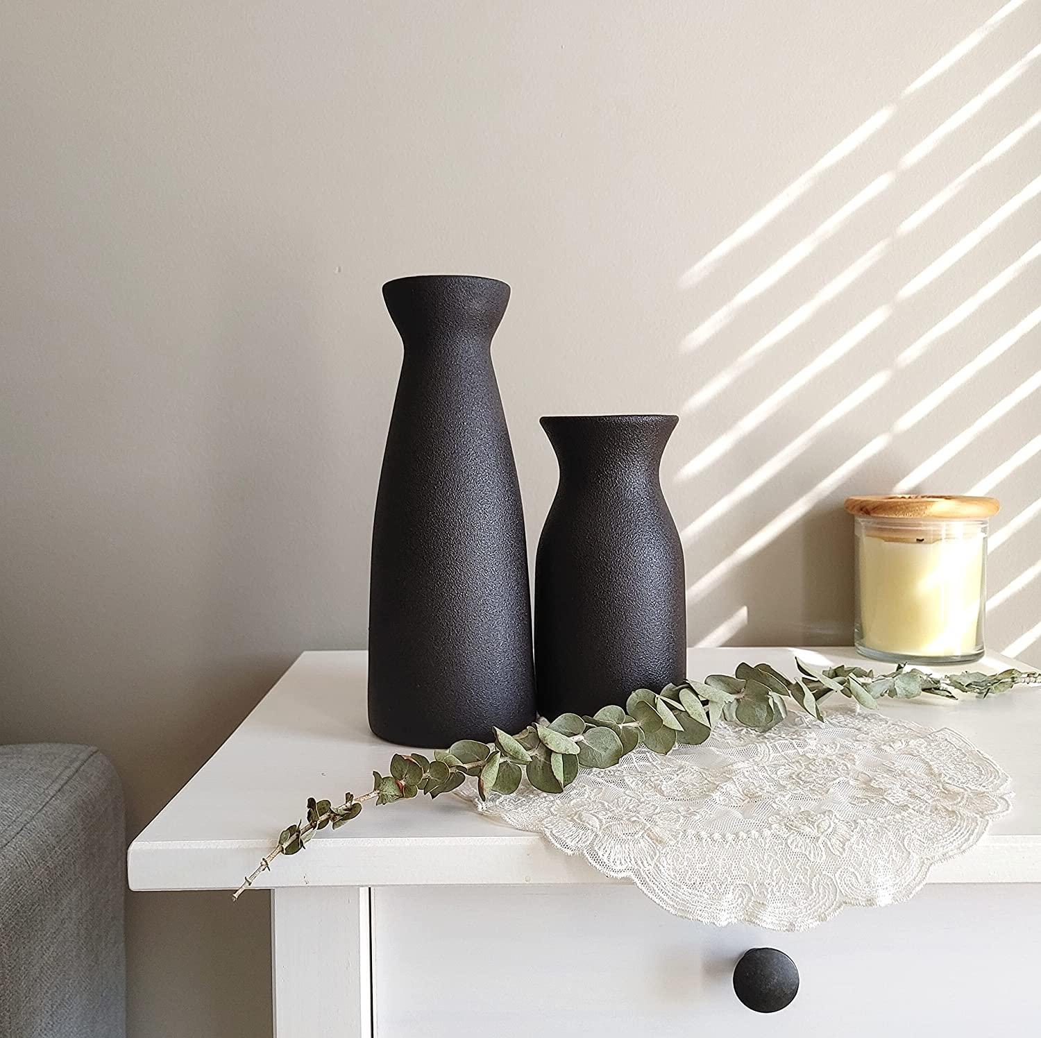 Minikle black ceramic vase set: $30 