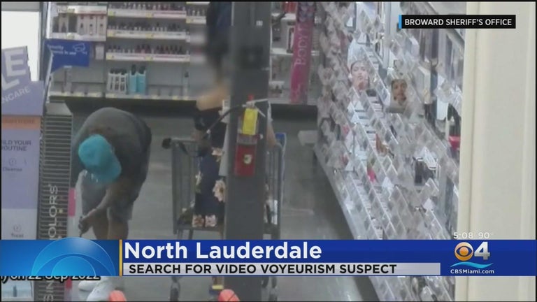 Broward sheriff seeks man caught on store camera placing phone under ...