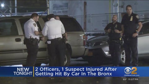 2 NYPD officers injured after being struck by car during foot chase in ...