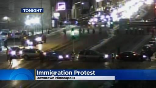 Immigration protesters block downtown Minneapolis intersection near Sen ...