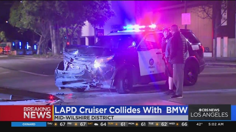 2 LAPD officers, BMW driver hospitalized after Mid-Wilshire crash - CBS ...