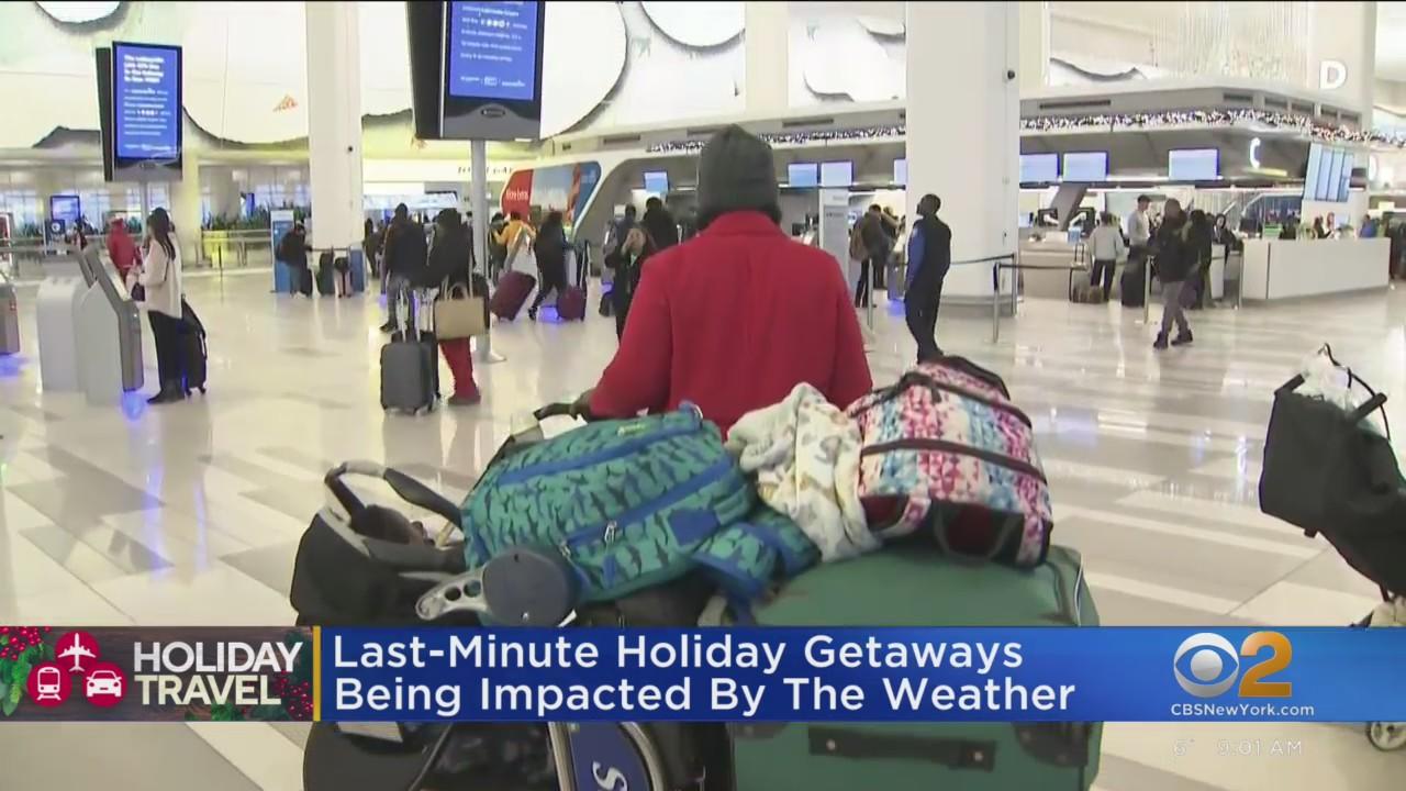 Many travelers stranded in aftermath of winter storm - CBS New York