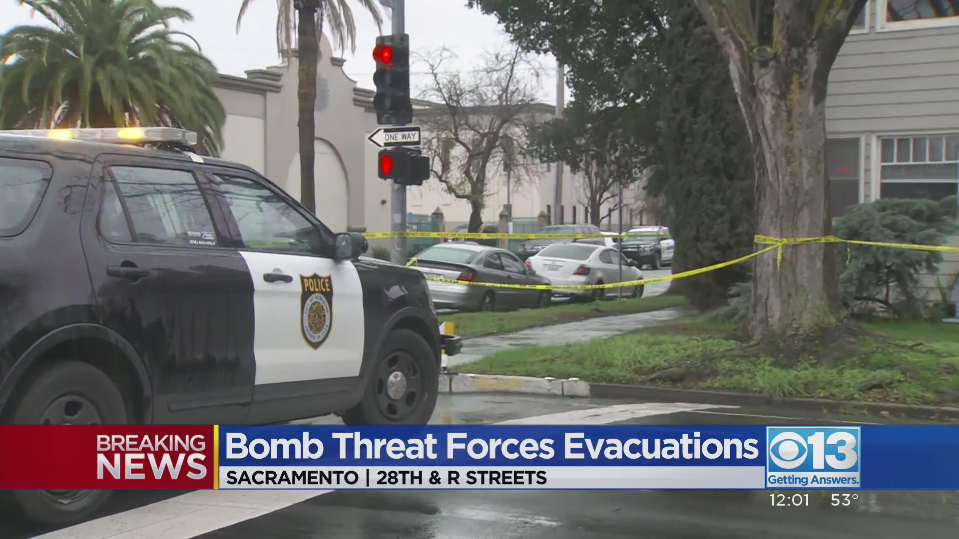 Suspect in custody, scene clear after bomb threat at Department of ...