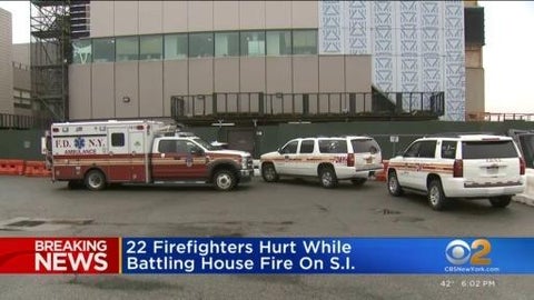 Nearly 2 dozen firefighters injured battling New York house fire - CBS News