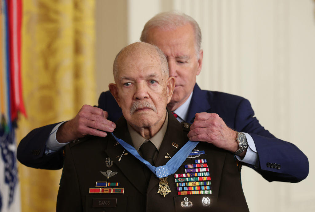 President Biden presents the Medal of Honor to retired U.S. Army Col. Paris Davis during a ceremony in the East Room of the White House on March 3, 2023. 