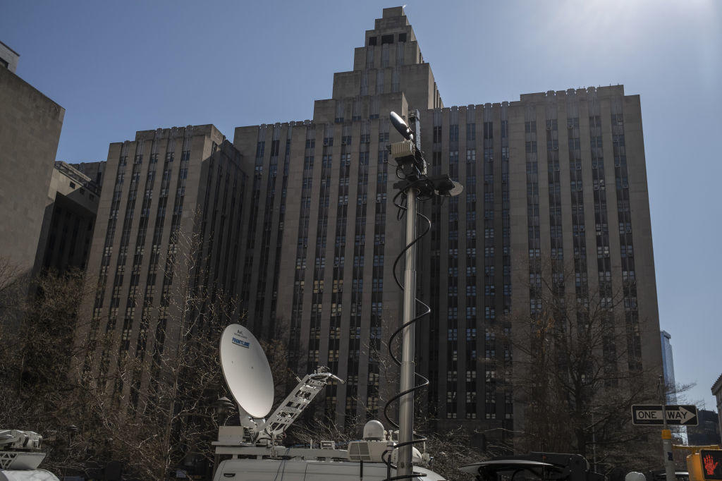 Media vans outside Manhattan Criminal Court in New York on Wednesday, March 29, 2023. 