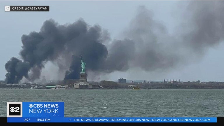 7-alarm fire in commercial area of Jersey City spreads to nearby brush ...