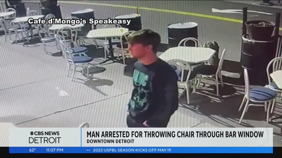 Suspect caught on video throwing chair into window of Detroit bar ...