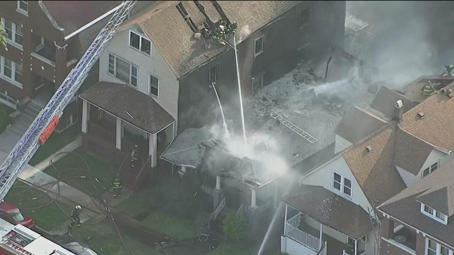 Crews battle fire spreading to 3 Chicago Lawn buildings - CBS Chicago