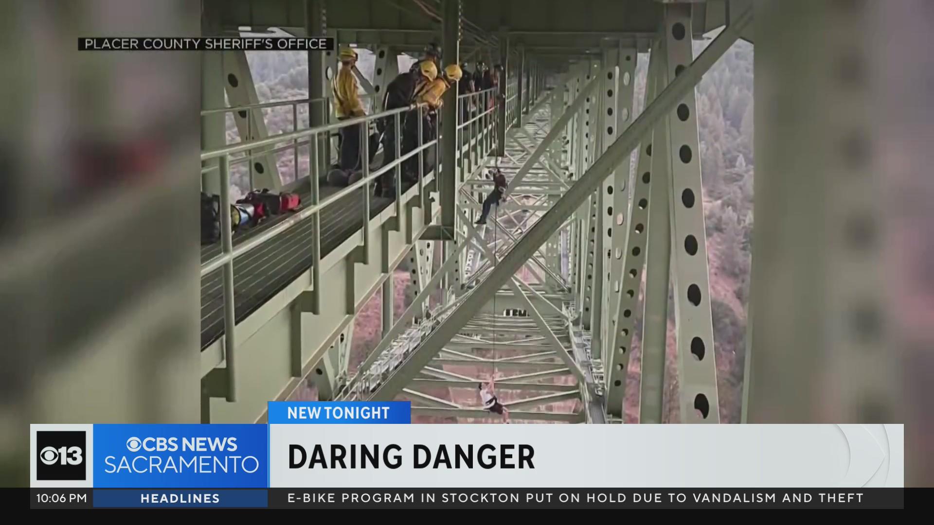 Teen rescued after getting stuck dangling 700 feet above river on