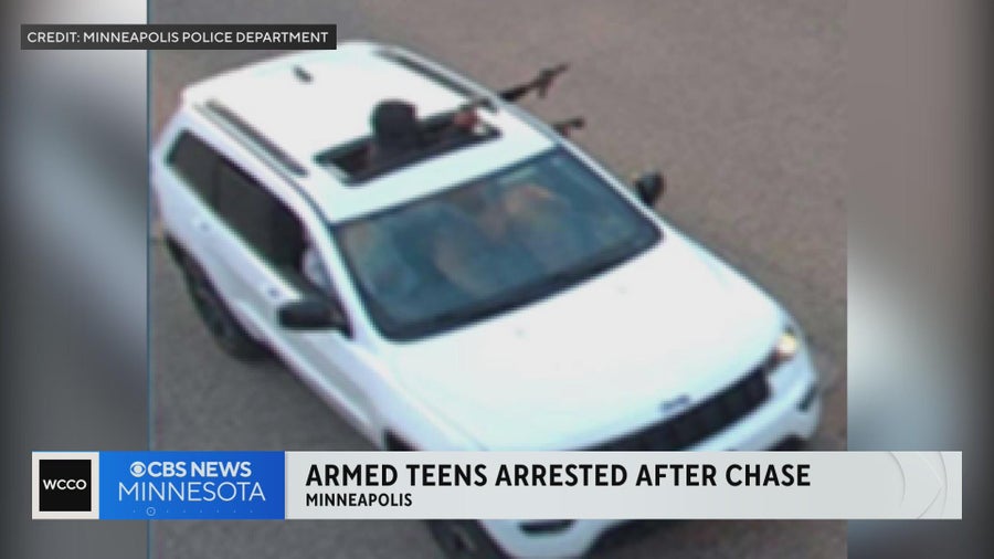 2 armed gunmen arrested following police pursuit in stolen SUV - CBS ...