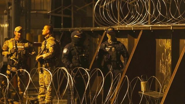 Judge temporarily blocks federal officials from removing razor wire set ...