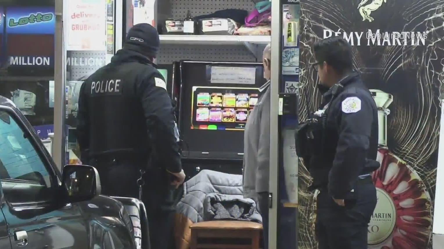 Chicago shooting: Liquor store employee shot in shoulder during ...