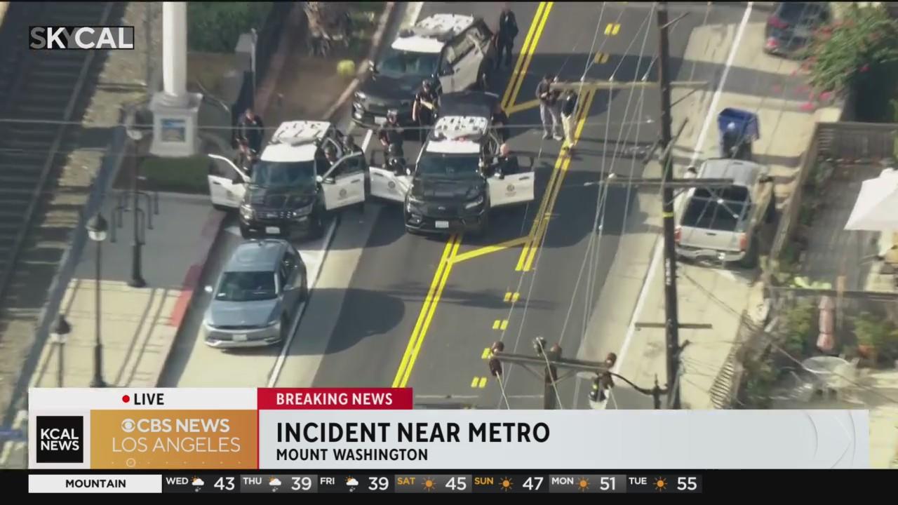 Armed rideshare suspect in custody after 3-hour standoff in front of Mt ...