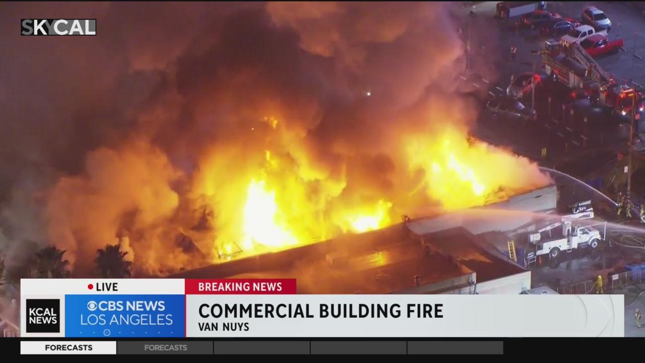 Firefighters battle massive fire at commercial building in Van Nuys ...