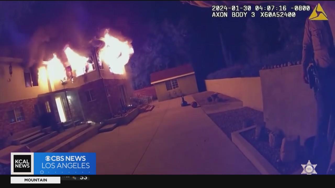 Deputies run into burning home to rescue people trapped inside - CBS ...