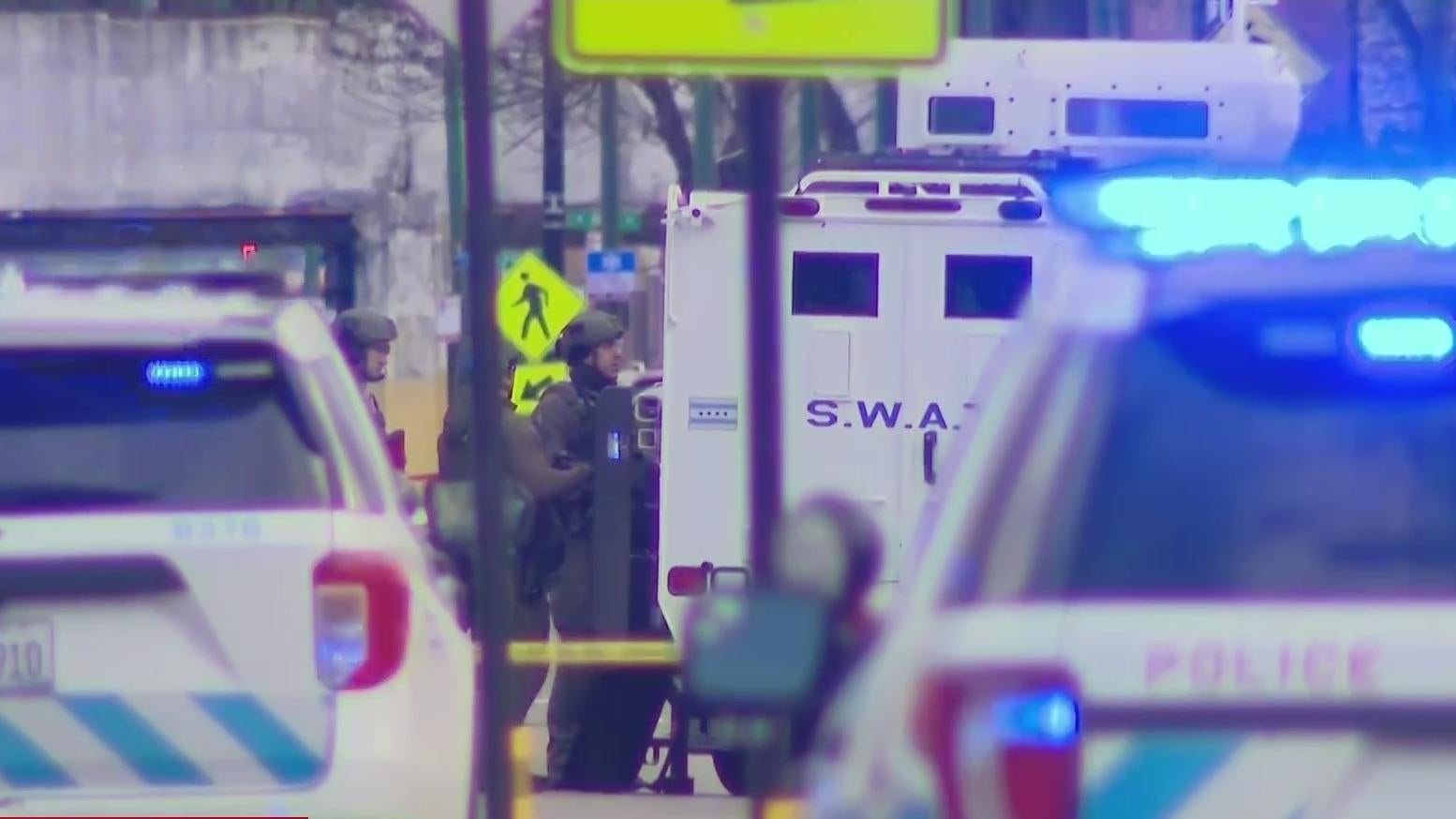 One in custody after shoot-out, 4-hour standoff with Chicago Police ...