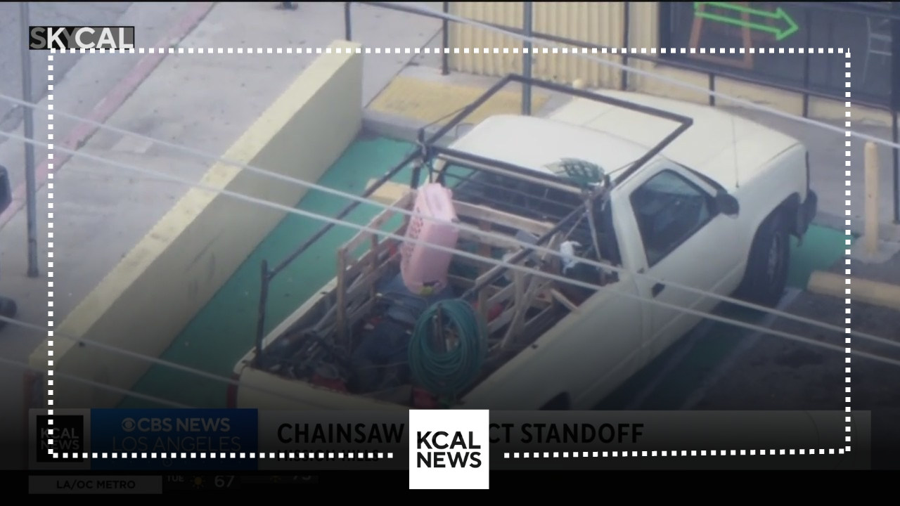 Man armed with chainsaw arrested after hours-long standoff in bed of ...