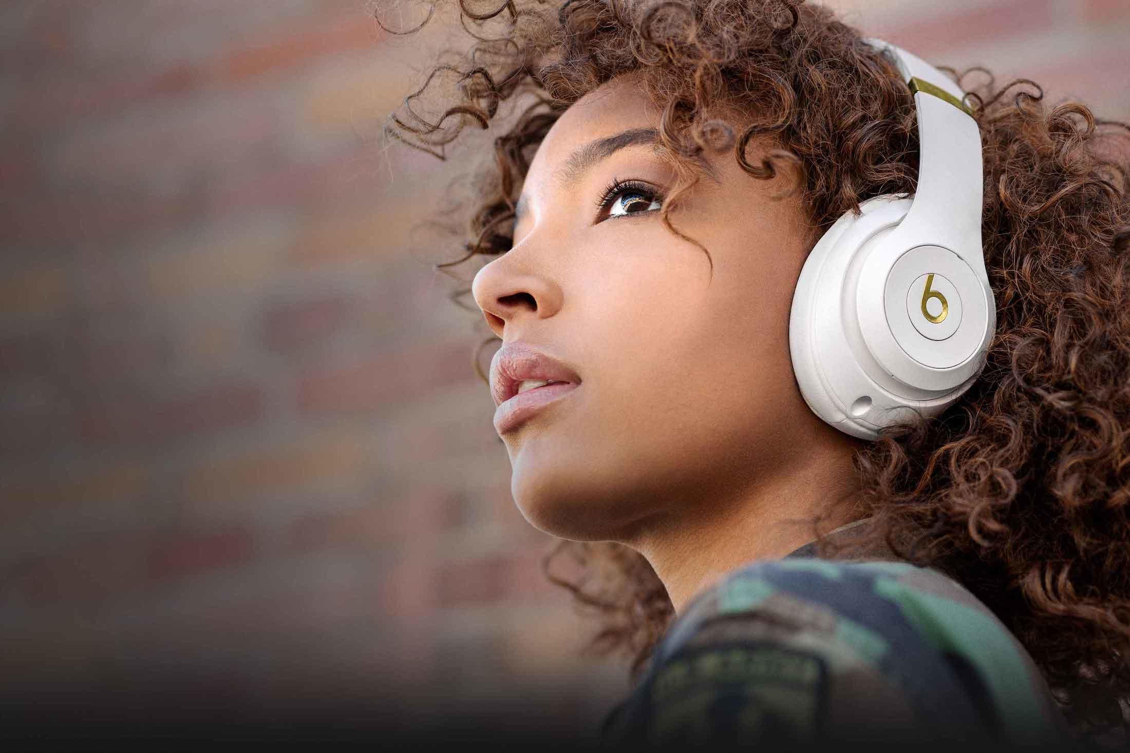 Woman wearing Beats headphones 