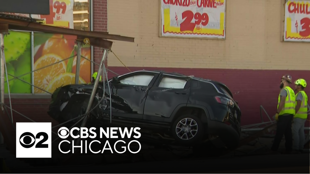 SUV crashes into car, scaffolding after running red light on Chicago's ...