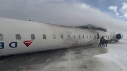 Delta plane crashes, flips upside down while landing in Toronto from