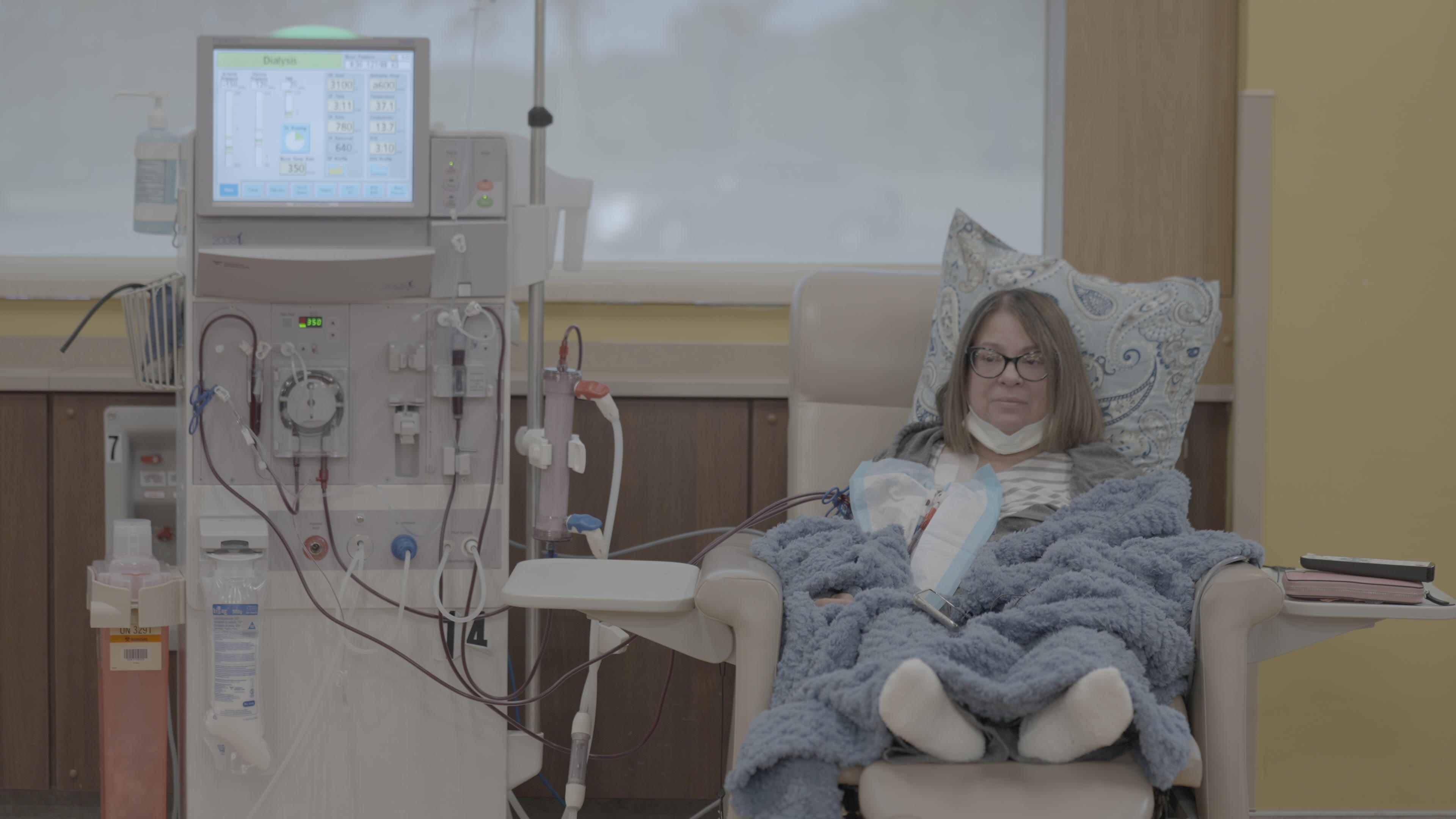 Melanie Knoll sits in her dialysis chair. She is a diabetic whose kidney failed and she's spent the last three years on dialysis waiting for a donor.