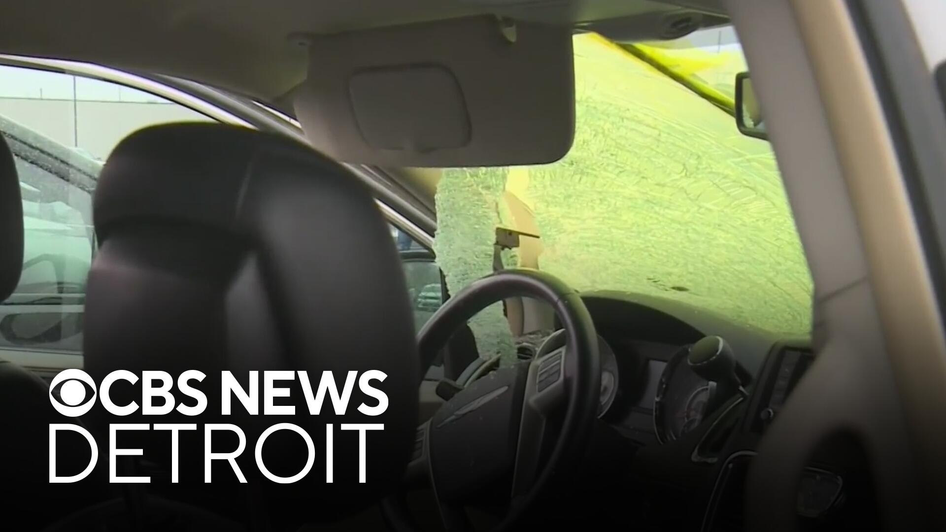 Woman injured after mysterious object smashes through her windshield