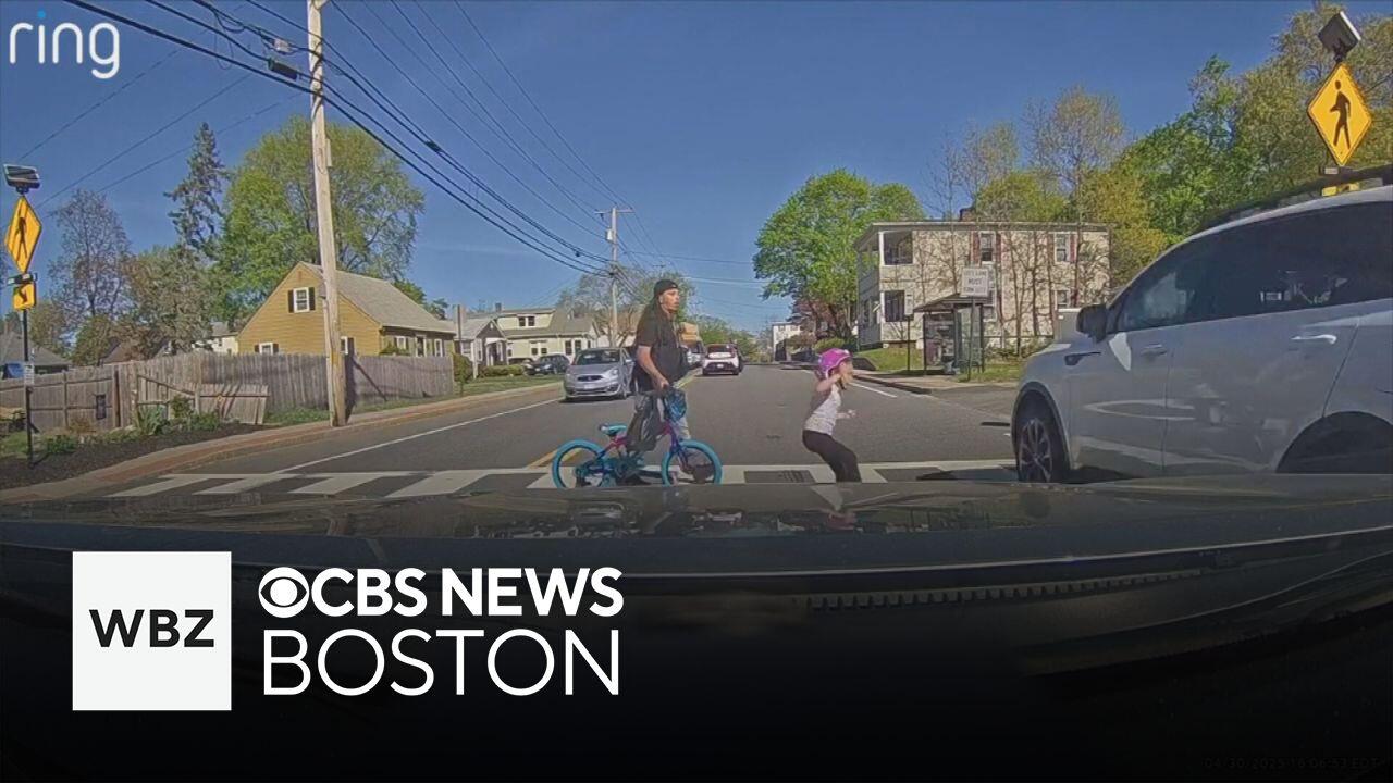 Scary video shows a young girl narrowly avoid getting hit by a car in ...