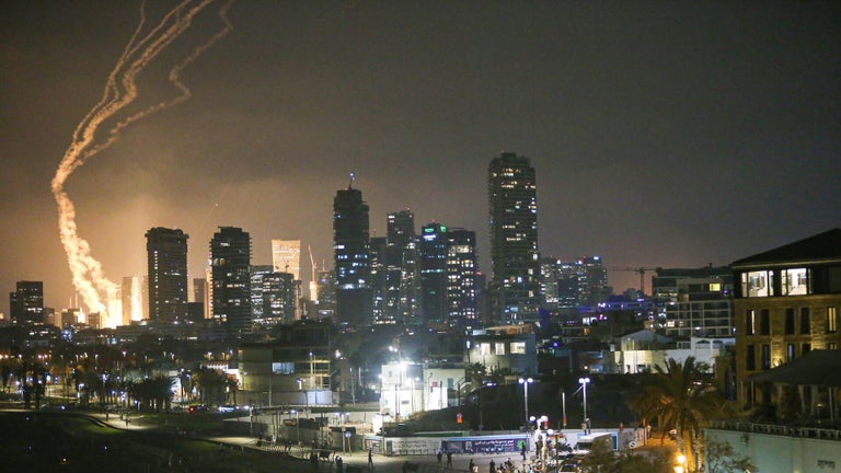 Iran launches missiles at Israel, and some hit Tel Aviv, as Israel