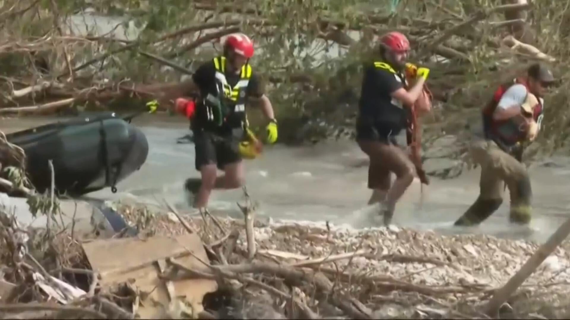 Texas flood rescue crews navigate tough terrain to search for missing